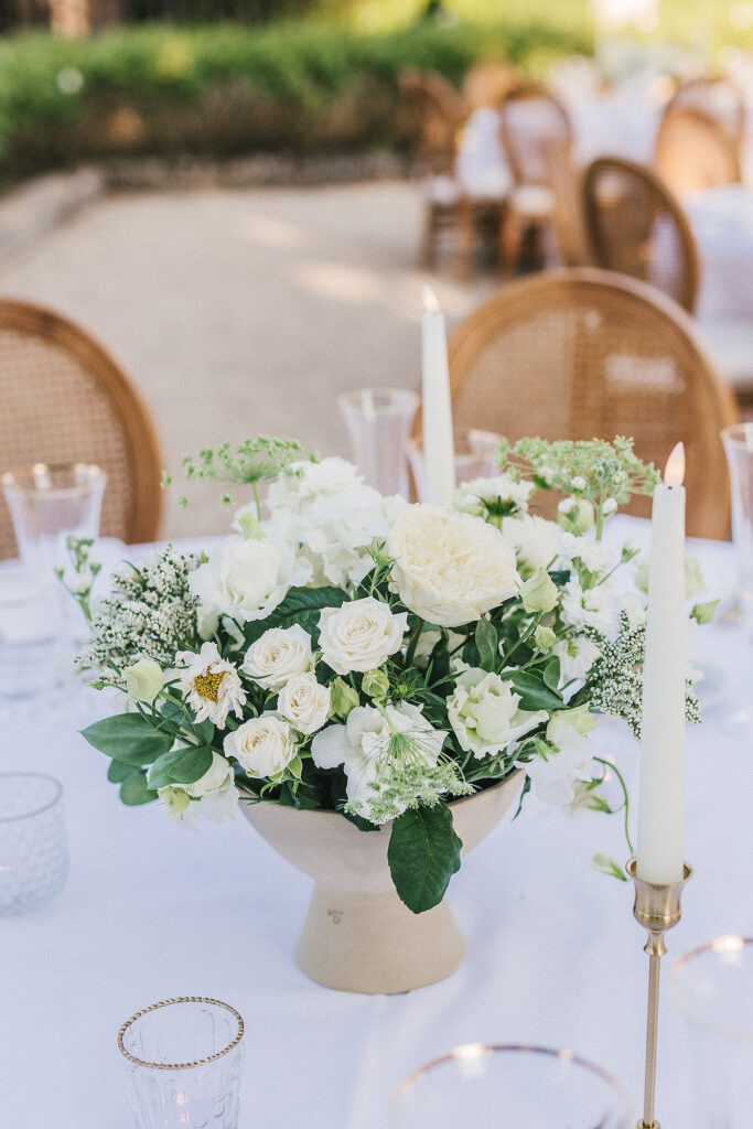 Stunning simple white wedding florals at French Wedding. 